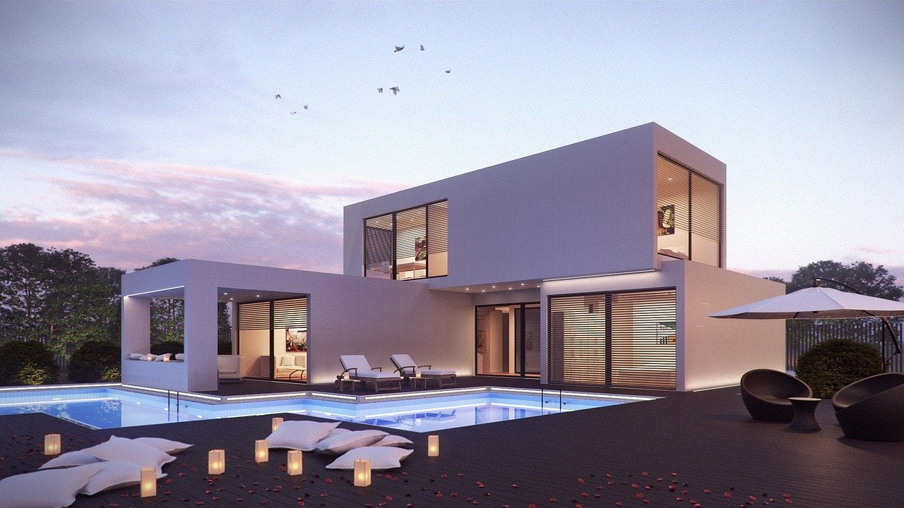 Maison contemporaine avec rénovation fenêtre Evian XXL et terrasse lumineuse.