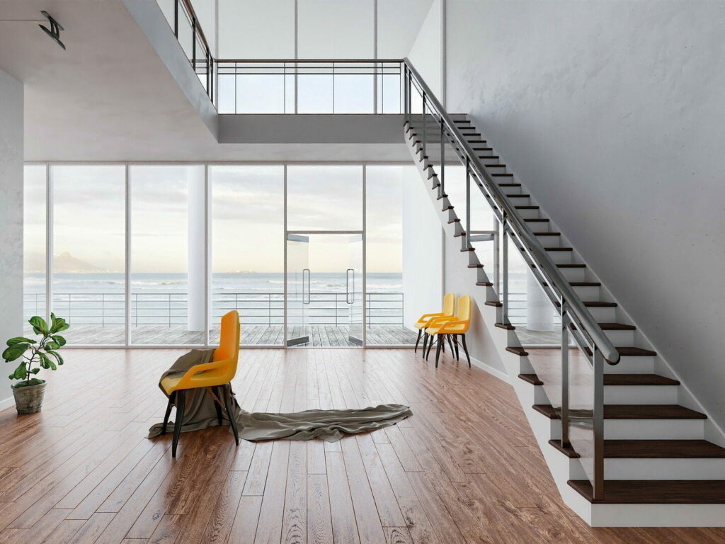 Intérieur design avec rénovation fenêtre Evian et larges surfaces vitrées.